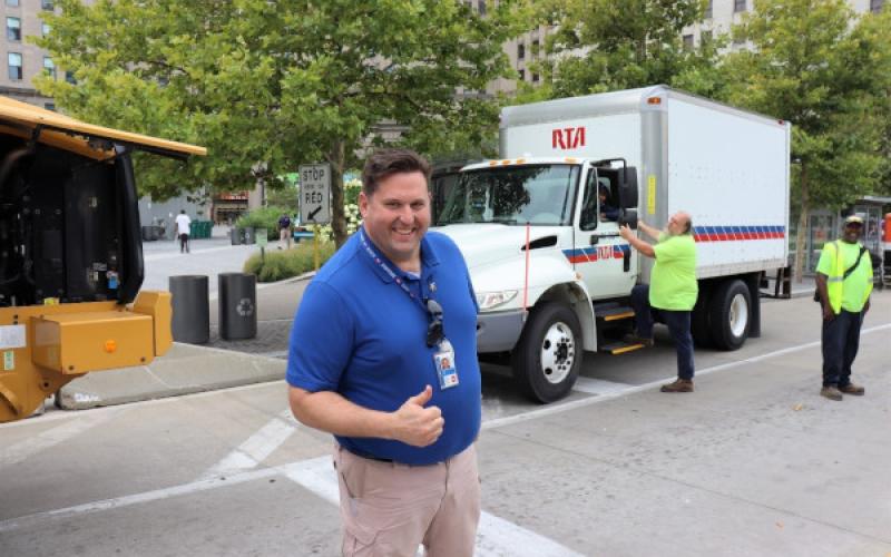 GCRTA Staff with GCRTA vehicles.