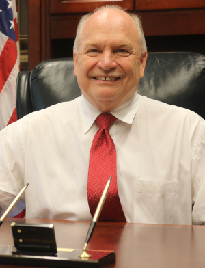 Board President and Westlake Mayor, Dennis M. Clough