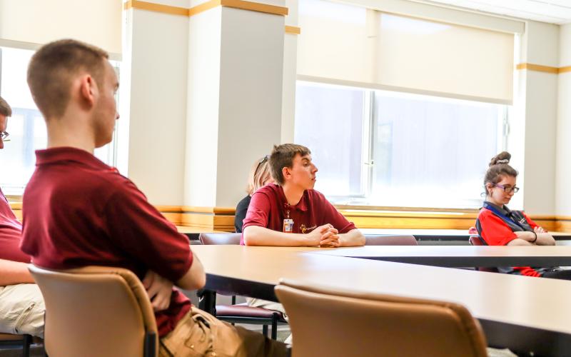 Students sitting classroom style.