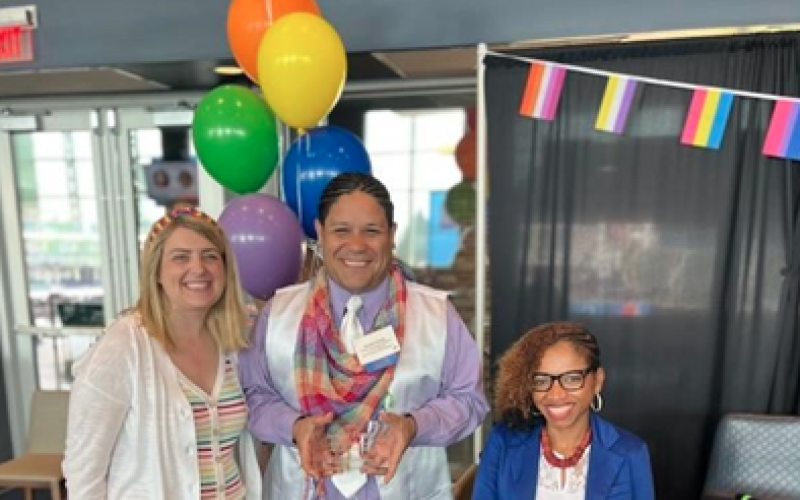 Ismael Flores holding his award with Ohio Diversity Council leaders, Laura Grajczyk (left) and TyKiah Wright-Wilson (right)