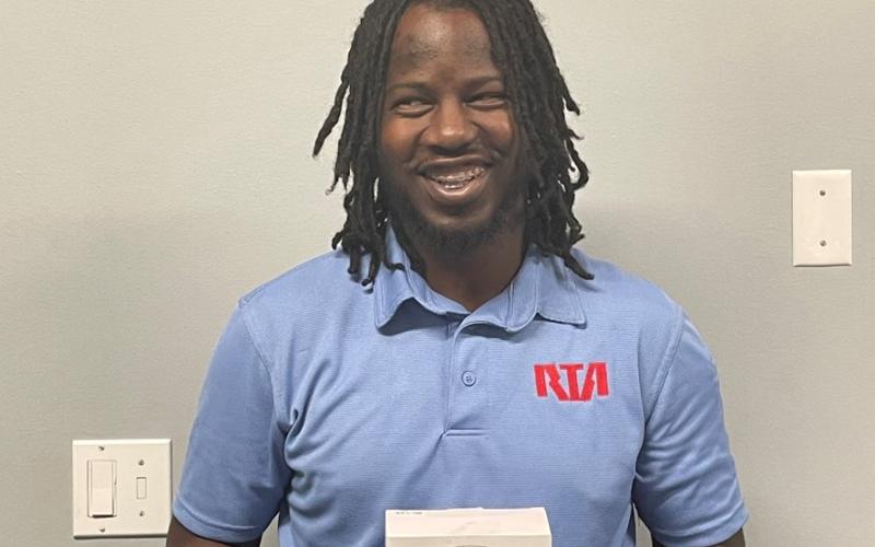 Operator Shaquille King, holding his Champions of Safety Award